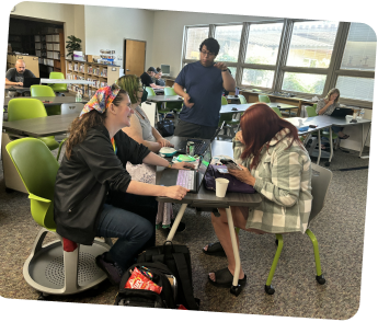 Teachers working on a quorum project in a learning workshop