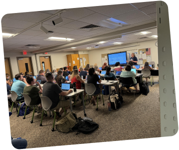 Sara Larkin teaching a group of teachers